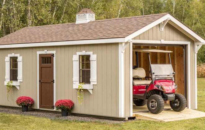 Garage door open on a Clay Elite Carriage Shed built by Adirondack Storage Barns