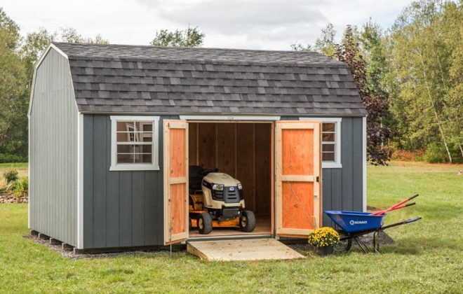 Dark gray High Barn with the doors open built by Adirondack Storage Barns