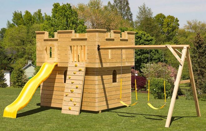 Medium wooden Castle playground built by Adirondack Storage Barns
