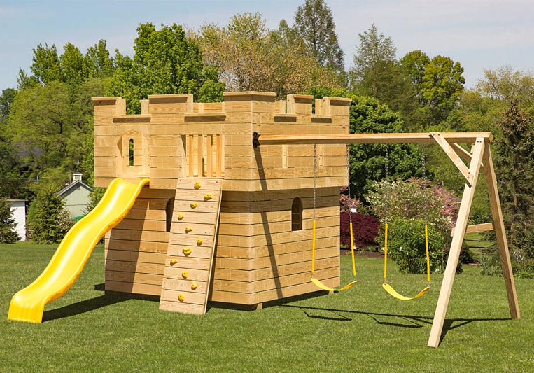 Medium wooden Castle playground built by Adirondack Storage Barns