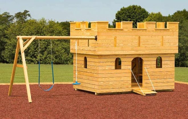 Large Castle wooden playground built by Adirondack Storage Barns