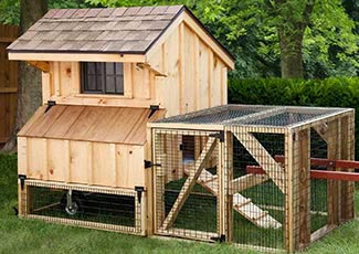 Tractor style chicken coop built by Adirondack Storage Barns