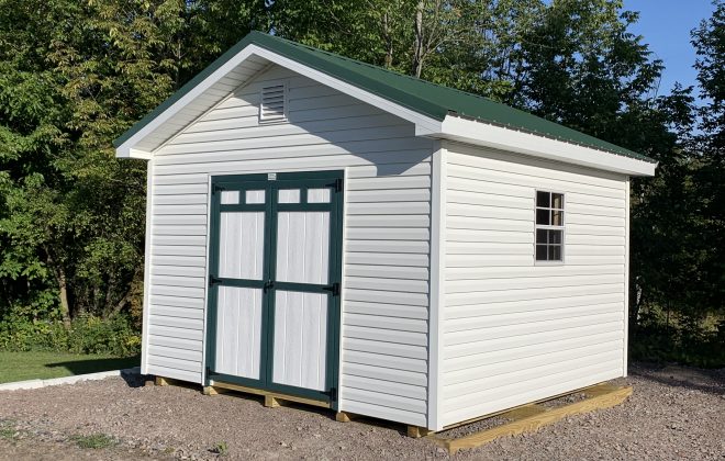 Vinyl Sided Storage Building w/Metal Roof built by Adirondack Storage Barns