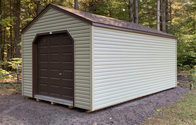 Cottage Carriage Shed w/Vinyl Siding built by Adirondack Storage Barns