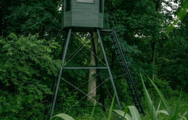 360 hunting blinds 360 outfitter model on edge of forest and field