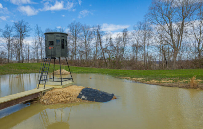 360 hunting blinds 360 outfitter model on island in pond
