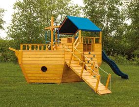 Small wooden boat playground built by Adirondack Storage Barns